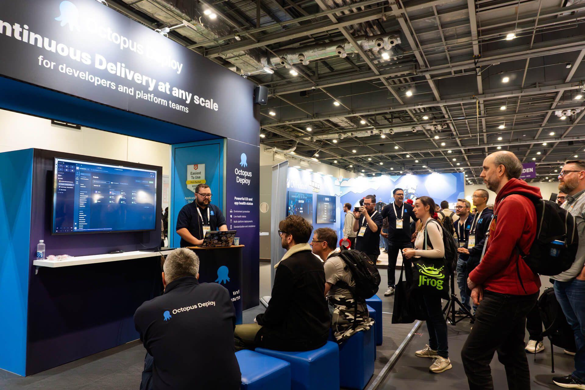 Liam Mackie presenting at the Octopus Deploy booth at KubeCon London.